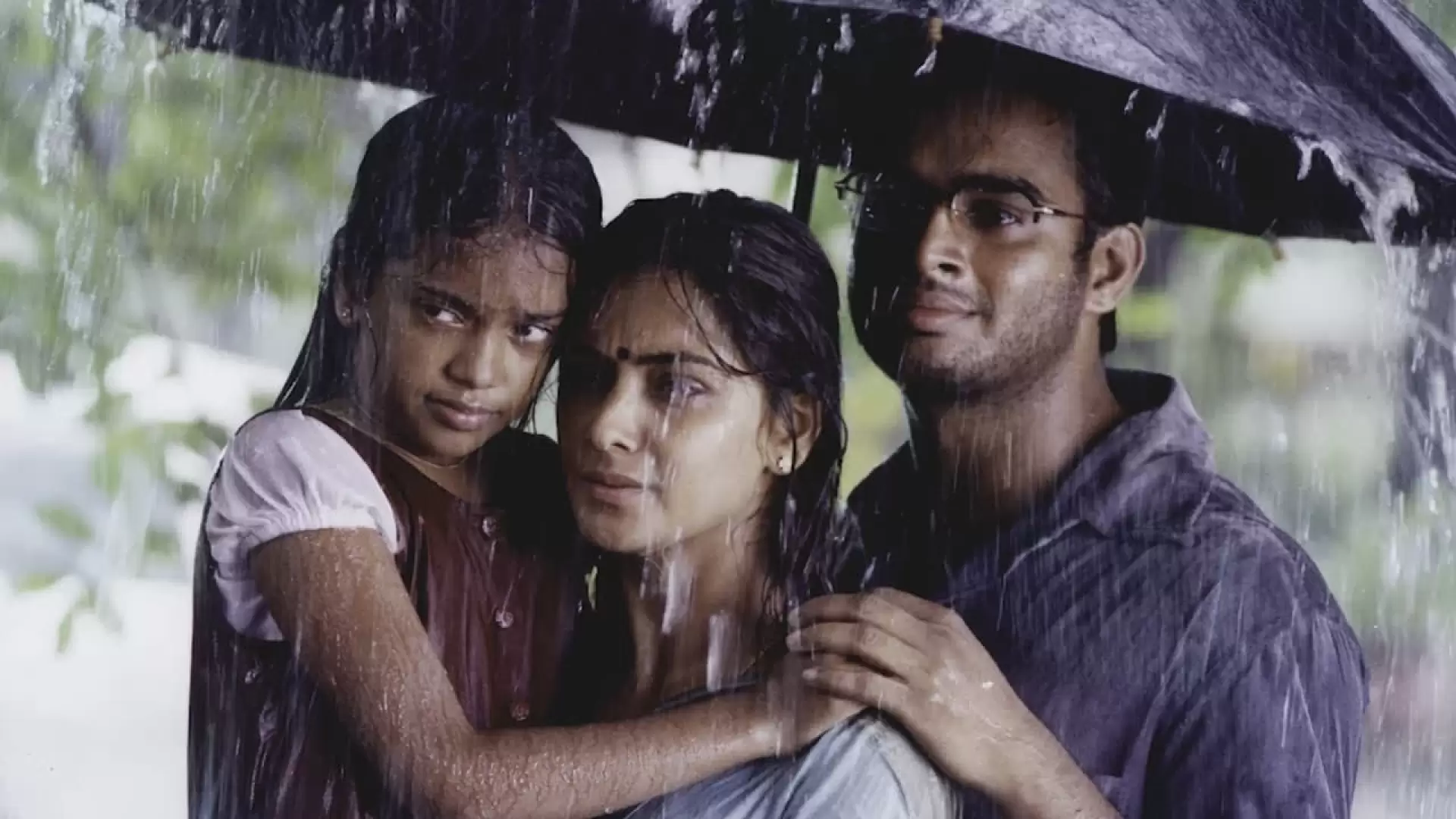 دانلود فیلم Kannathil Muthamittal 2002